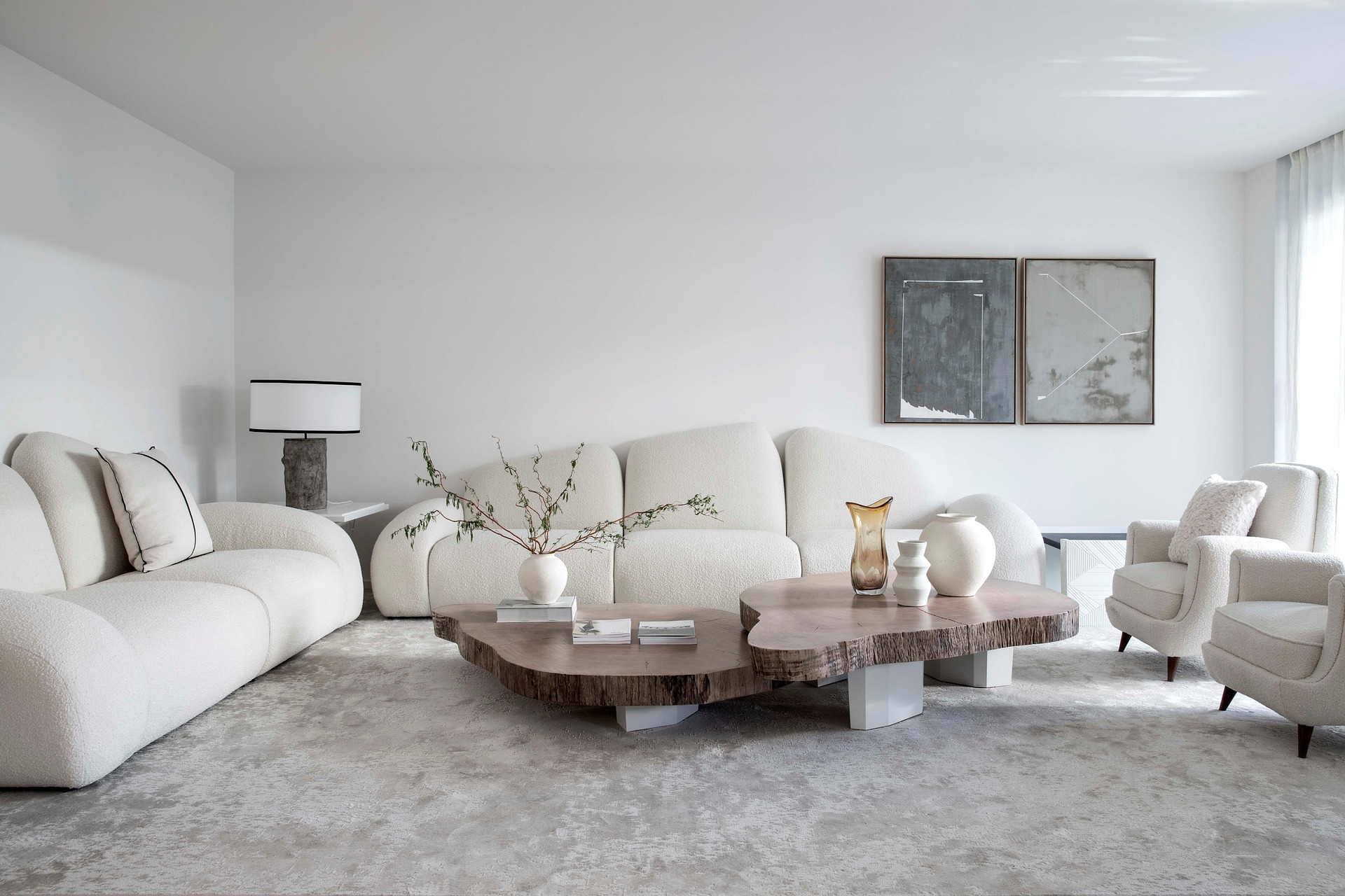 Living room with sculptural curved sofa and organic shapes