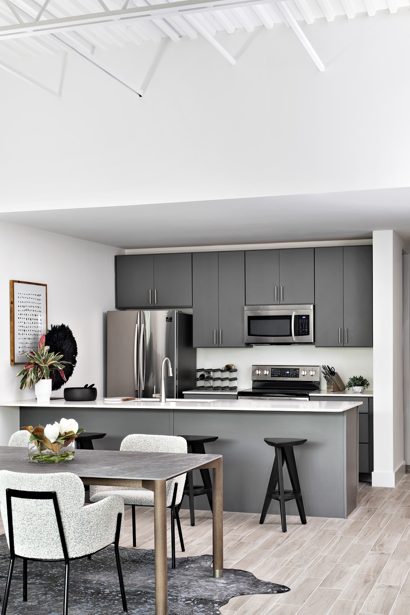 Modern luxury living room with styled coffee table and abstract art